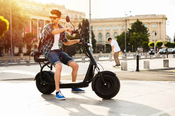 Electric Urban Transportation Handsome Young Man Student Backpack Sunglasses Sitting — Stock Photo, Image