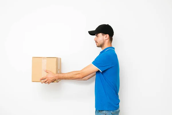 Delivery Man Standing Profile Offering Mail Package Cardbox Someone White — Stock Photo, Image