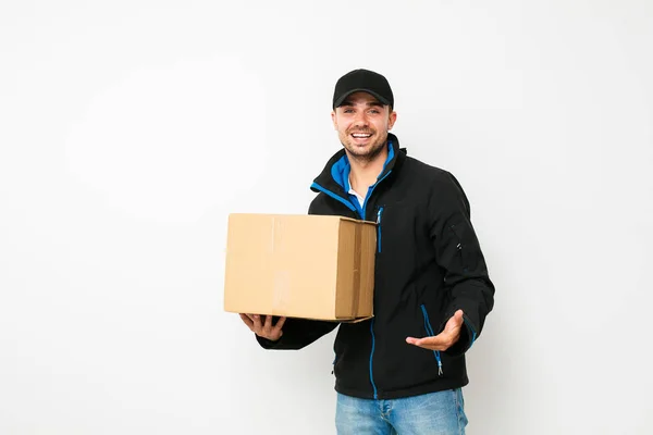 Delivery Man His Package Cardbox Hands Wite Background — Stock Photo, Image