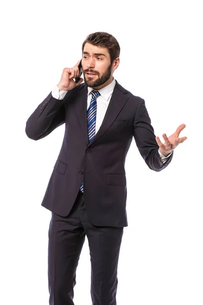 エレガントなビジネスマンの会話を携帯電話で白い背景の上に立って企業マン — ストック写真