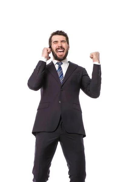 企業人 良いニュースを携帯電話に乗って白い背景の上に立ってエレガントなビジネスマン — ストック写真