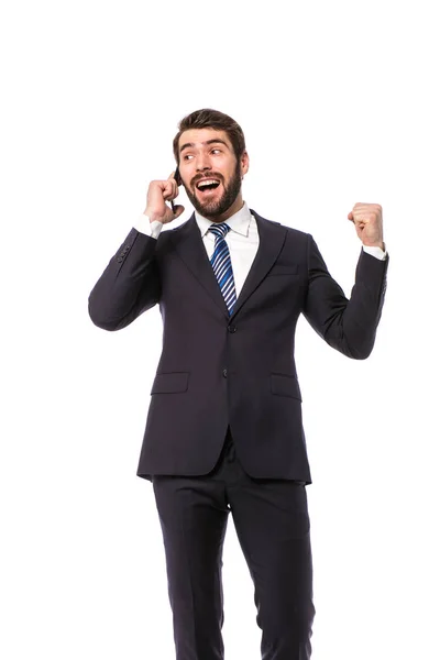 企业的人 优雅的商人站在白色的背景得到手机上的好消息 — 图库照片