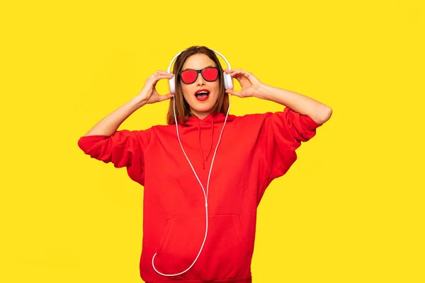 Young Rebel Girl Red Hoodie Headphones Sunglasses Listening Music Cool — Stock Photo, Image