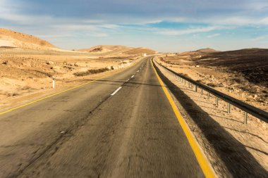 car road on a desert landscape clipart