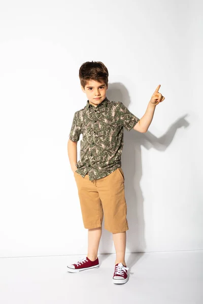 Young boy posing on white background — Stock Photo, Image