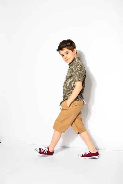 Young boy posing on white background — Stock Photo, Image