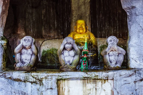 Three monkeys as a symbol of see no evil, hear no evil, speak no evil