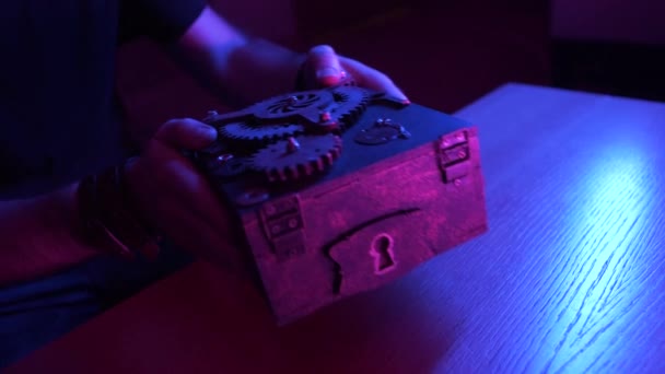 Caucasian Man Sitting Large Table Puts Small Wooden Box Black — Stock Video