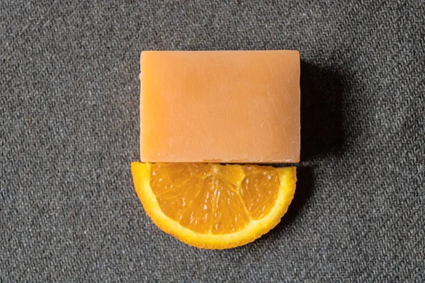 Handmade orange soap top view with the slice of orange - Image