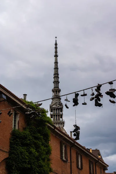 View at the Mole Antonelliana with the string with shoes, Turin, Italy