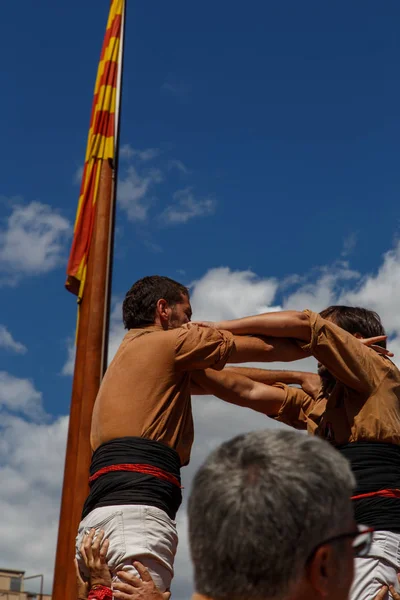 Barcelona, Katalonya, İspanya, 11 Eylül 2017: Catalunya'nın bağımsızlığını ralli desteği ulusal gün boyunca Castellers. Katalonya gelen bir gelenek Castellers.