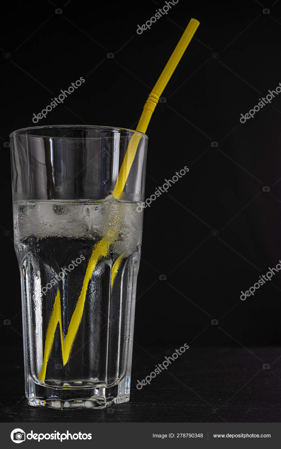 Glass Cup Water Ice Cubes Yellow Straw Black Background Vertical Stock Photo Image By C Arantxaforcada Glass Cup Water Ice Cubes Yellow Straw Black Background Vertical Stock Photo Image By C Arantxaforcada