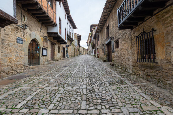 Horizontal view of a medieval cobbled street in Santillana del Mar, Spain, October 1, 2020