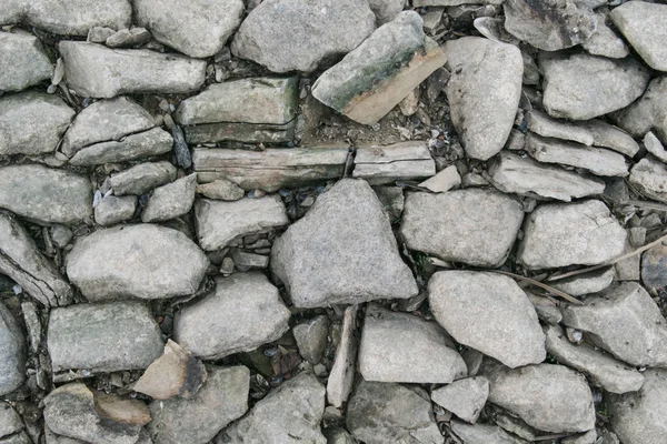 Piedras Del Antiguo Pavimento Que Apareció Debido Poca Profundidad Del —  Fotos de Stock