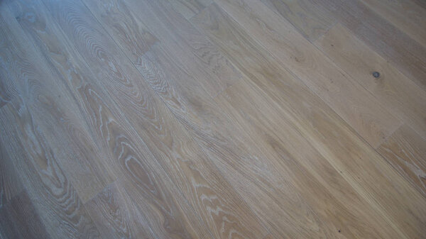 Rustic oak floor with masseur and branches, as texture, background and macro