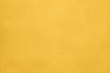 Kağıt sarısı arka plan. Kağıt sarısının dokusu. Boşluğun kopyası olan boş bir sayfa