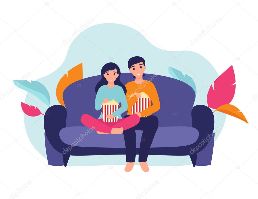 girl and man with popcorn on the couch