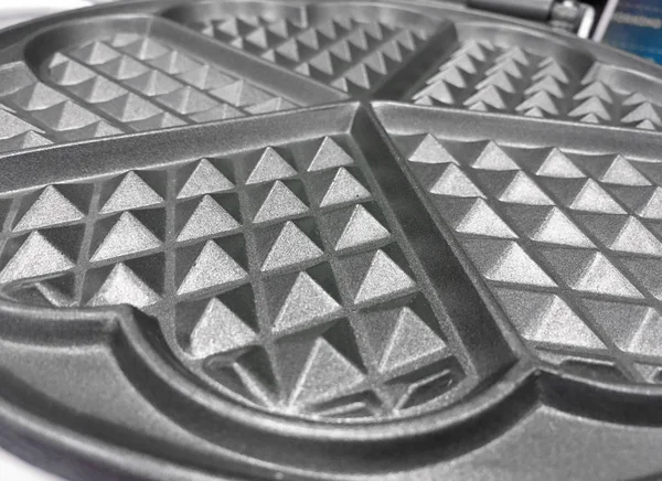 A close up shot of a silver waffle iron texture — Stock Photo, Image