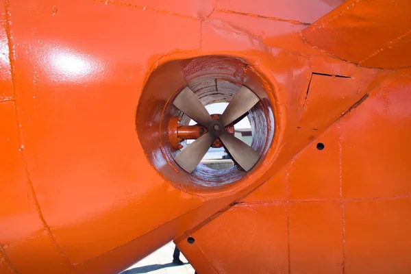 Tail end with thruster propeller of the orange-white Large underwater bathyscaphe. — Stock Photo, Image