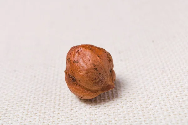 Jádro z ořechů ovoce na ubrusu zavřít pozadí — Stock fotografie