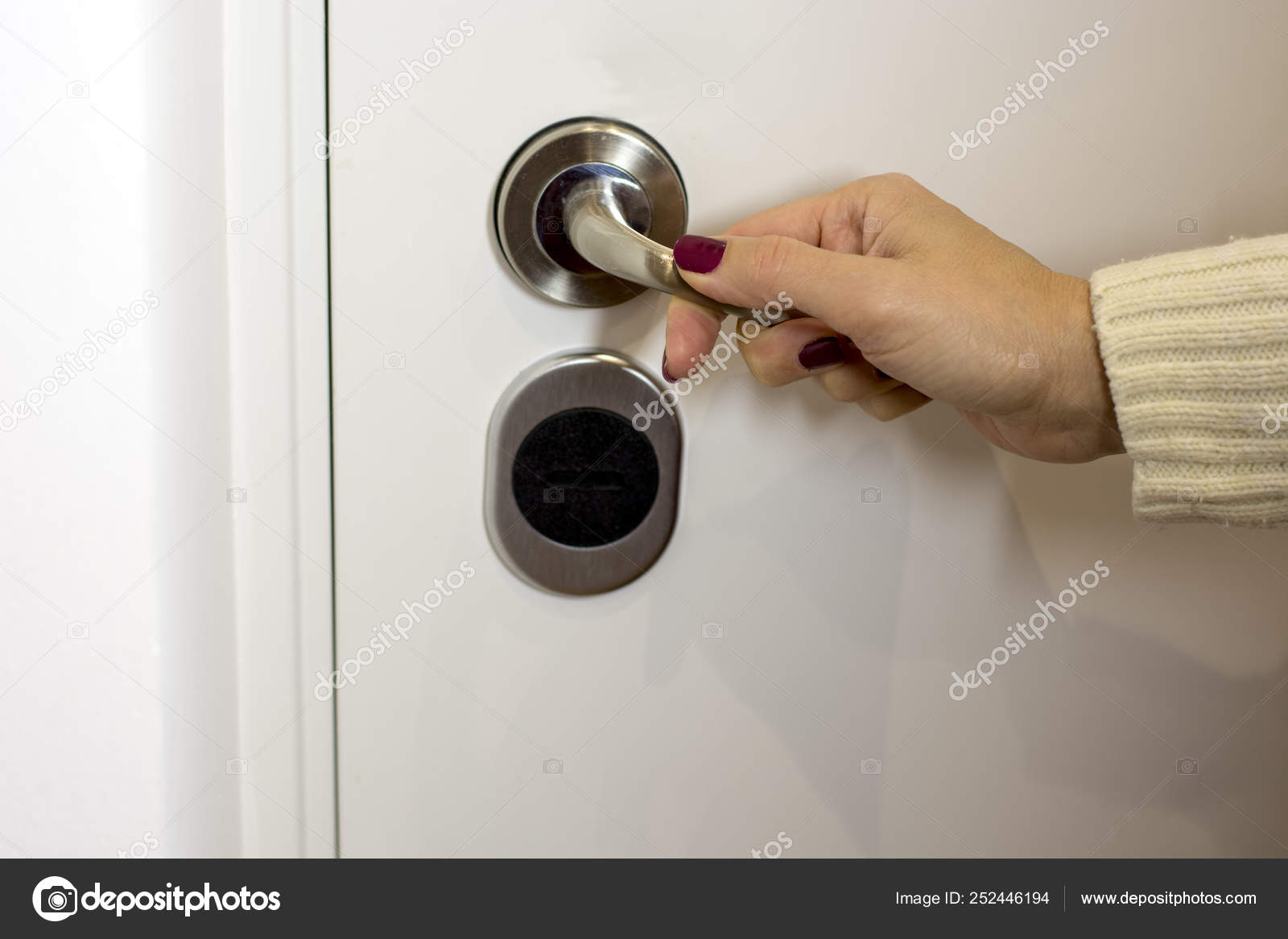 Close View Female Hand Red Nails Opening Door Knob Stock