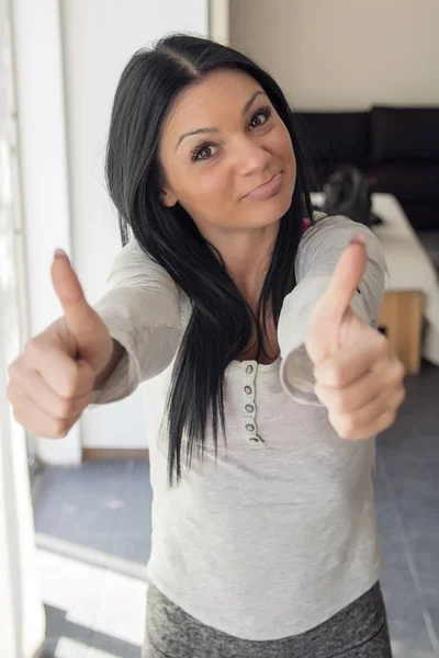 Woman Showing Thumb Up Sign