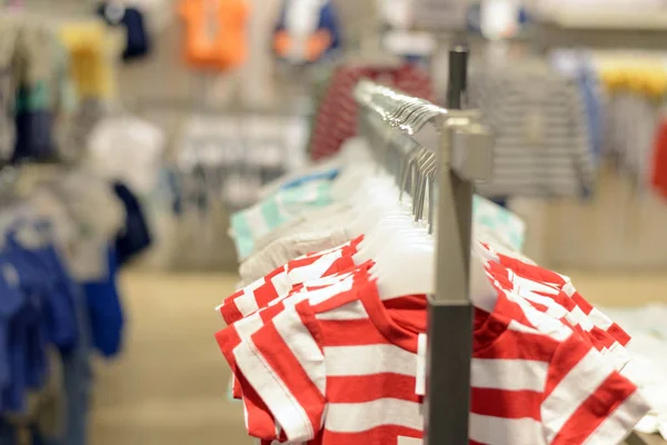 Dresses hanged in a clothing store