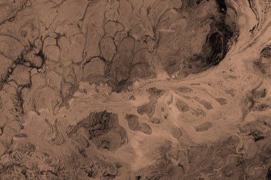 Soyut kahverengi arkaplan, boyalar dekoratif dokuyu karıştırır