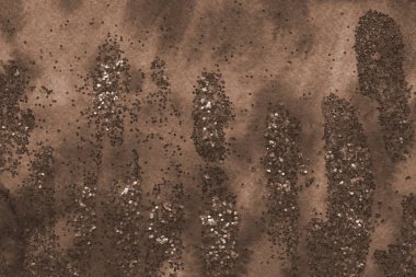 Soyut kahverengi arkaplan, boyalar dekoratif dokuyu karıştırır