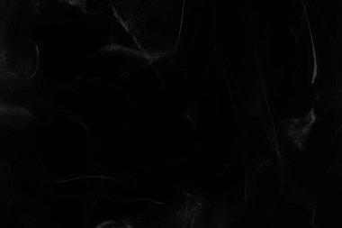 Siyah kağıt arka planda renkli mürekkep. Doku