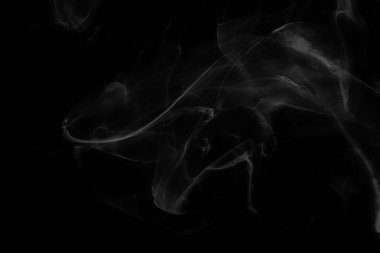 Siyah kağıt arka planda renkli mürekkep. Doku