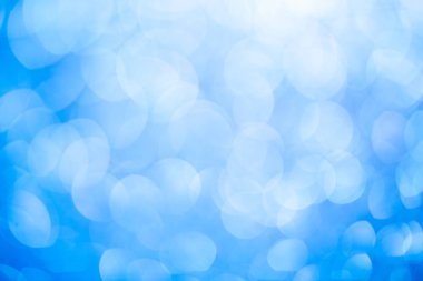 Mavi bokeh yaz soyut arka plan.