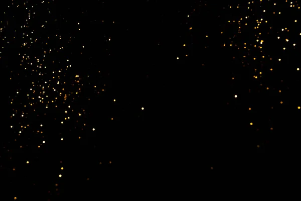 Gold abstract bokeh. Black background — Stock Photo, Image