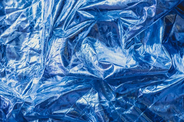 The texture of the crumpled fabric is metallic blue color. — Stock Photo, Image