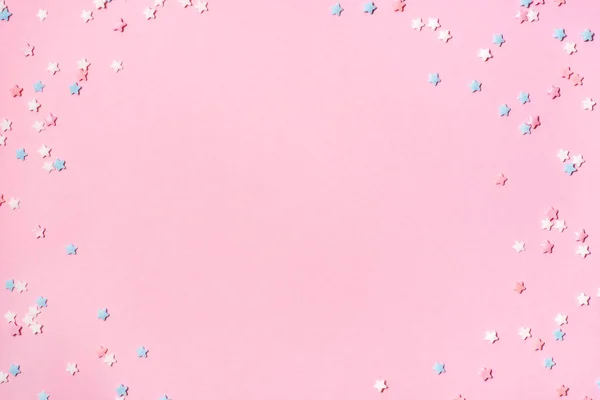 Μικρά αστέρια κομφετί σε ροζ φόντο — Φωτογραφία Αρχείου
