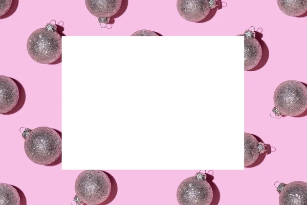 Pattern made of silver balls on pink background. — Stock Photo, Image