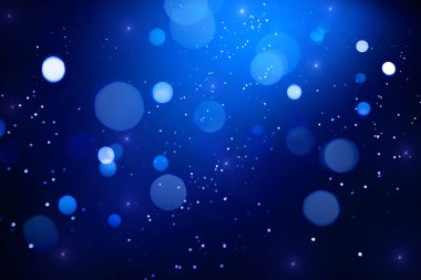 Koyu arka plan üzerinde Mavi soyut bokeh.