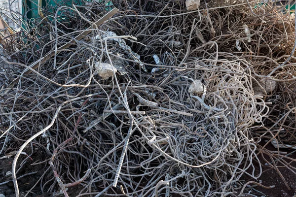 construction site metal wires trash pile outdoor