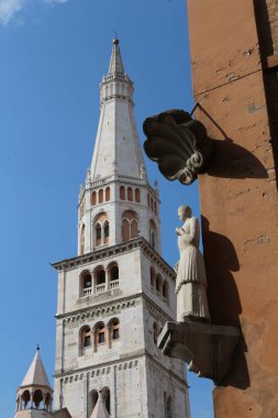 Modena, Italy, Ghirlandina tower and Bonissima statue, touristic place clipart