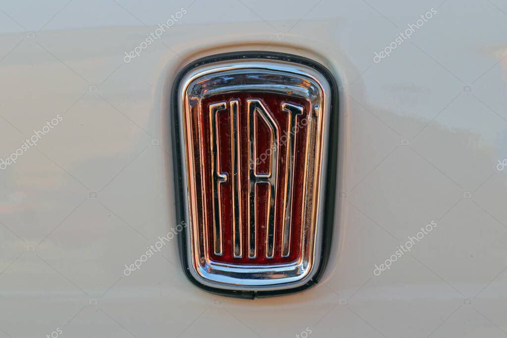 Vintage classic car detail, Fiat logo on the Fiat 500 model