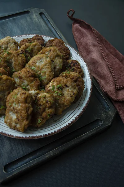 Pork cutlets on a plate. View from above. — Stock Photo, Image