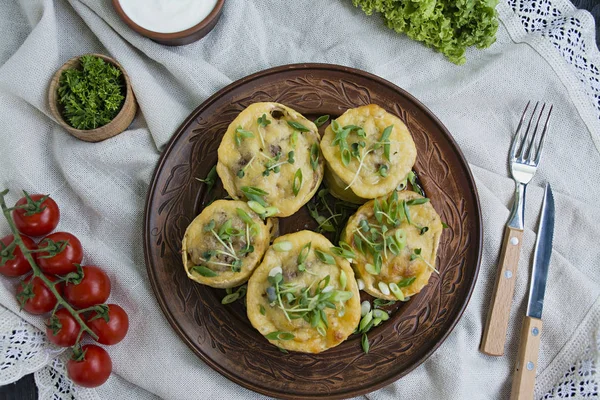 Squash stuffed with minced meat, vegetables and sprinkled with hard cheese. Side view.