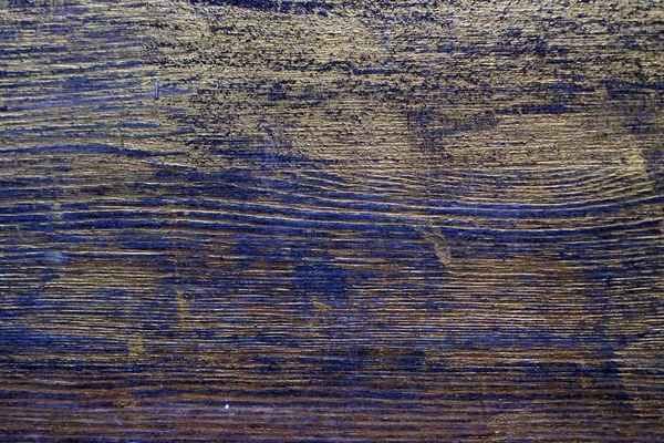 Siyah leke ve altın boya ile tedavi ahşap doku. Antika ahşap yüzey tedavisi. Siyah leke ve altın boya ile tedavi ahşap doku.
