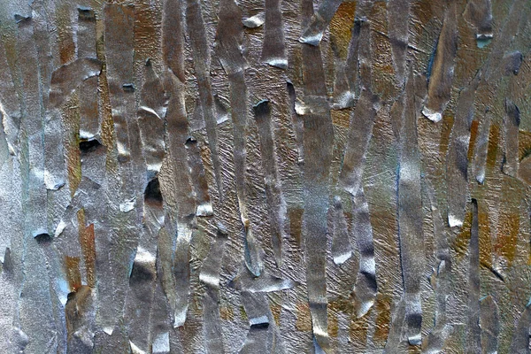 gümüş sprey ile boyanmış maskeleme bandı parçaları. altın ve gümüş metalik tonları