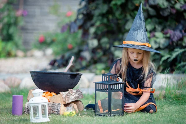 Happy girl in halloween costume with jack pumpkin.Trick or treat — Stock Photo, Image