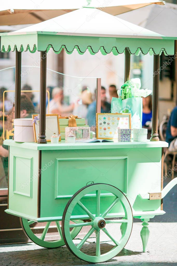 Brightly colorful ice cream cart outdoors