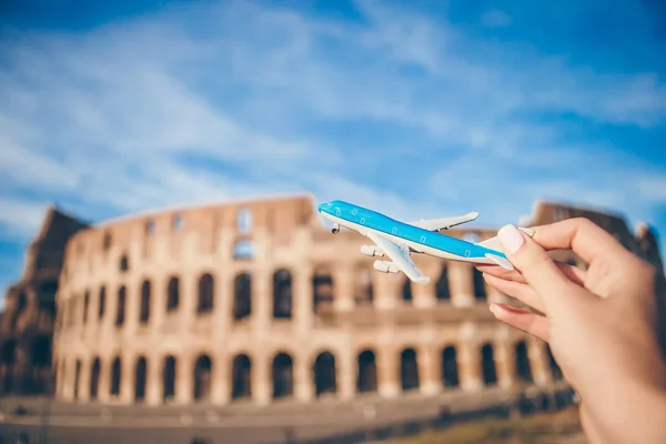 Small airplane model background Coliseum, Rome, Italy — Stock Photo, Image