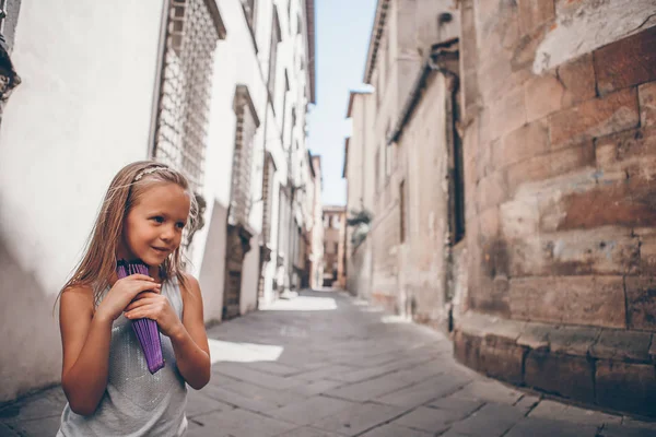 Adorable fashion little girl outdoors in European city Stock Photo