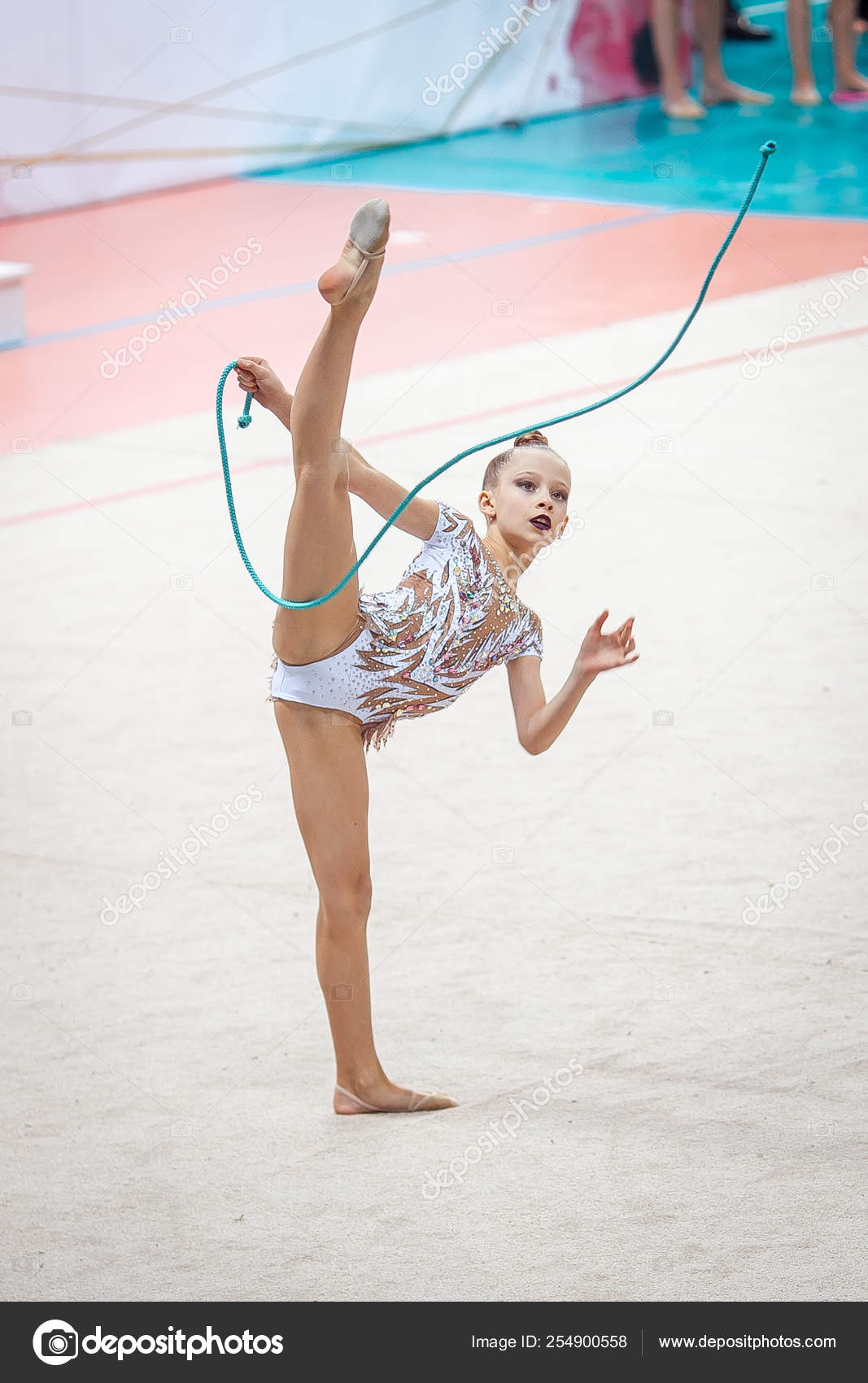 Little gymnast training on the carpet and ready for competitions Stock  Photo by ©d.travnikov 254900558