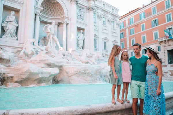 Family near Fontana di Trevi, Roma, Italy.